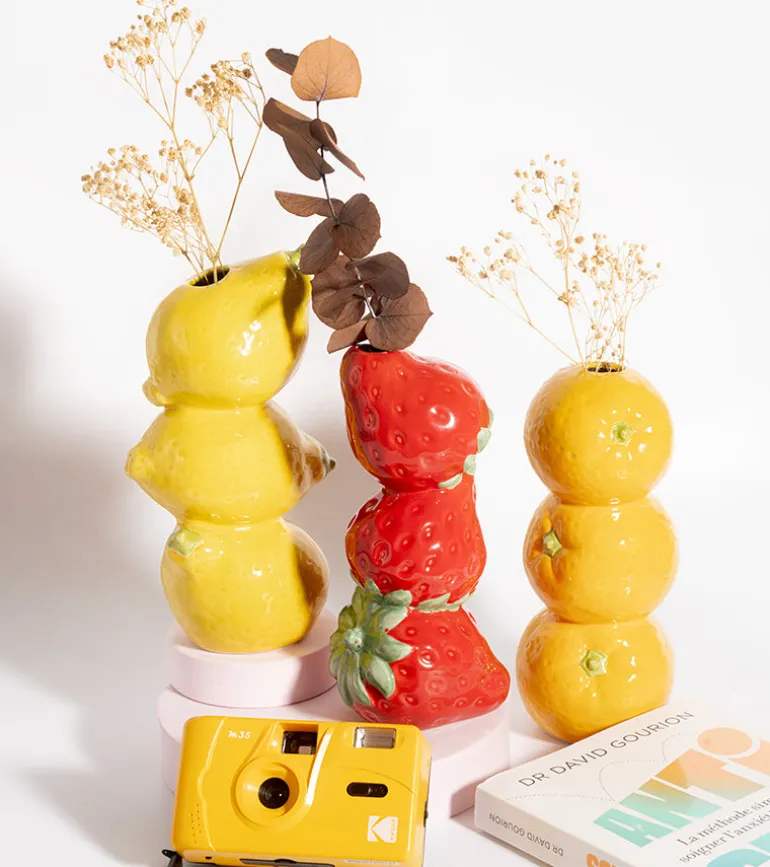 Vase fruits empilés