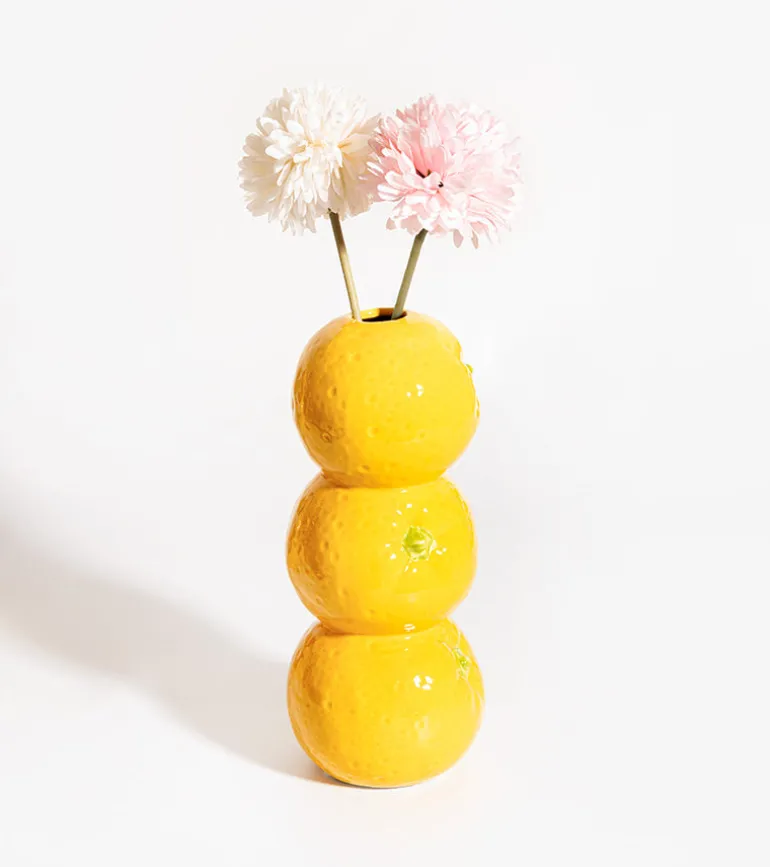 Vase fruits empilés